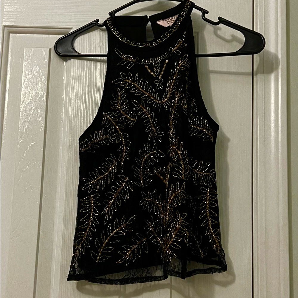 Black top with gold embroidered leaves